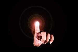 Hand Pointing with Glowing Finger on Black Background, Symbolizing Touchscreen Technology and Innovation, Perfect for Digital, Futuristic, and Tech-Themed Projects photo