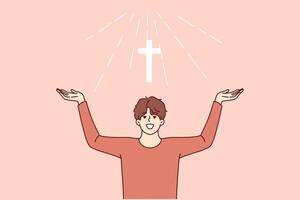 Man with christian cross above head rejoices at light coming from heaven and calls to pray vector