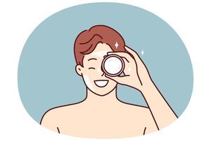 Man demonstrates jar of cream bought in cosmetic store to moisturize his face or get rid of wrinkles vector