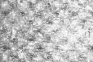Black dots grunge halftone texture effect on white background. vector