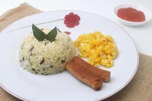 Indonesian specialties namely a plate of lime leaf fried rice which is a blend of rice photo