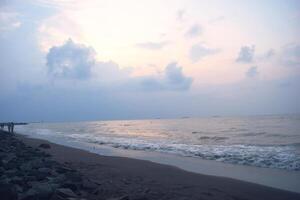 Atmosphere on the beach cities of Tegal which is often called Pantai Alam Indah photo