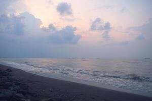 Atmosphere on the beach cities of Tegal which is often called Pantai Alam Indah photo