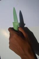 sharp kitchen knives used for cooking, knife set of various shapes and uses put together on a white background photo