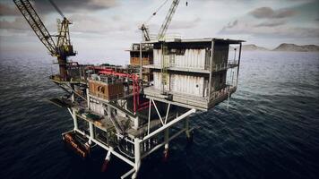 Large Crane on Building in the Middle of the Ocean video