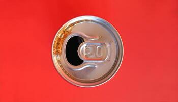 cola tin can red background photo