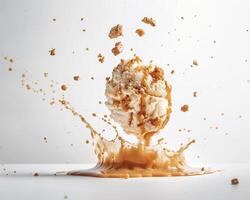 an ice cream ball is being splashed with caramel photo