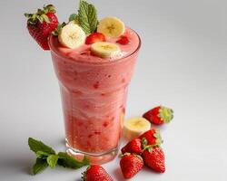 a smoothie with strawberries and bananas photo