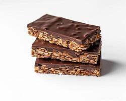 chocolate granola bars on white background photo