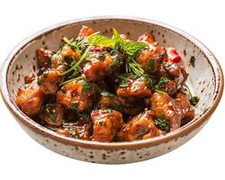 a bowl of meat and herbs on a white background photo