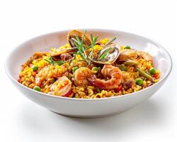 a bowl of rice with shrimp, clams and vegetables photo