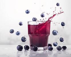 blueberry juice splash with blueberries on white background photo