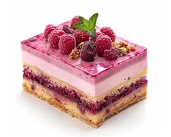 a piece of cake with raspberries and nuts on top photo
