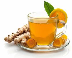 a cup of tea with ginger and oranges photo