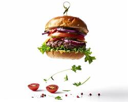a hamburger is being suspended in the air photo