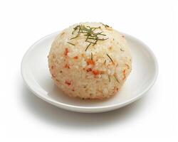 a white plate with a rice ball on it photo