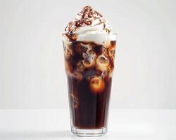 an iced coffee with whipped cream and chocolate syrup photo