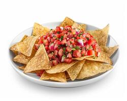 a plate of nachos with salsa on a white background photo