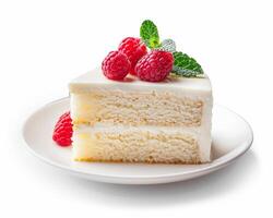 a piece of cake with raspberries on top photo