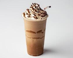 a chocolate milkshake with whipped cream and chocolate drizzle photo