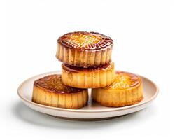 a plate of three small cakes sitting on top of each other photo