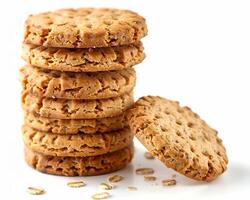 a stack of cookies with oats on a white background photo
