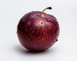 a red apple with water droplets on it photo
