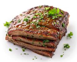 a piece of meat with a garnish of parsley photo