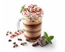 a glass of iced coffee with whipped cream and peppermint photo