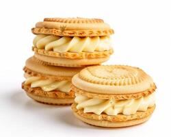 three cookies with cream on top of each other photo
