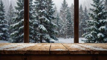 Empty wooden table on white blurred window with snowy Christmas trees forest outside background, Empty space of Christmas celebration banner. photo