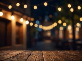 Wooden holiday empty table, night view, blurred bokeh lights background. photo