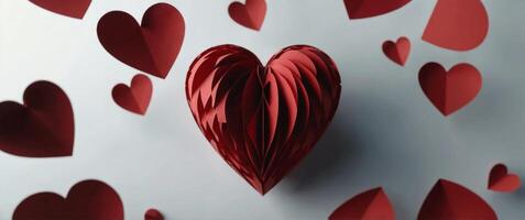 Abstract red heart in paper style on background. photo