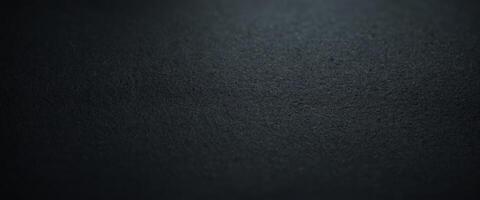 Dark grey paper texture background surface. photo