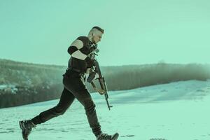 Special forces soldiers with weapon take part in military maneuver. war, army, technology and army concept photo
