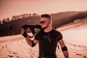 Special forces soldiers with weapon take part in military maneuver. war, army, technology and army concept photo