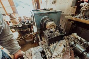Close-up photo of a lathe working on wood. Mechanical processing of wood