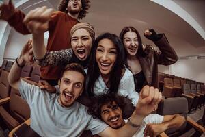 In a heartwarming scene, a diverse group of friends gathers around a television, radiating joy and unity as they collectively witness and celebrate a joyful event together. photo