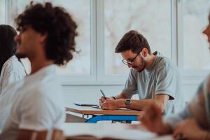 A group of diverse students engages in lively discussion as they educate themselves in a modern classroom, embracing the power of collaboration and knowledge exchange. photo