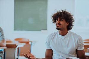 In a modern classroom, an African American student appears visibly perplexed, reflecting a moment of uncertainty and intellectual challenge photo