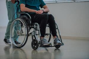 African American student pushing his friend's wheelchair through a modern school, demonstrating inclusion, accessibility, and the power of friendship.Assistance to people with disabilities photo