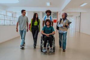 In a modern university, a diverse group of students, including an African-American student and a hijab-wearing woman, walking together in the hallway, accompanied by their wheelchair-bound colleague. photo