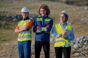 A team of engineers and workers oversees a wind turbine project at a modern wind farm, working together to ensure the efficient generation of renewable energy photo