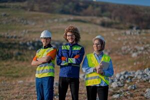 A team of engineers and workers oversees a wind turbine project at a modern wind farm, working together to ensure the efficient generation of renewable energy photo