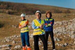 A team of engineers and workers oversees a wind turbine project at a modern wind farm, working together to ensure the efficient generation of renewable energy photo
