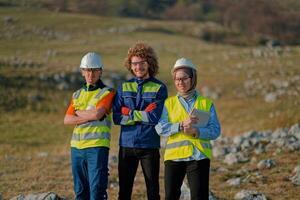 A team of engineers and workers oversees a wind turbine project at a modern wind farm, working together to ensure the efficient generation of renewable energy photo