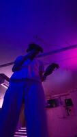 The player plays the game using virtual reality. Neon style. video
