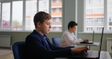 Caucasian Pupils Boys Working With Laptops In Computer-Based Class, Web-Design And Coding Classes video