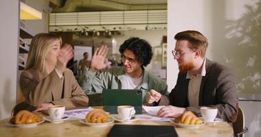 Group Of Co-Workers And Business Owners Meeting In Cafe, Collaboration And Teamwork video