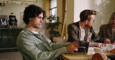 Programmer Specialist Man Creating New Website For Business, Works With Laptop, Meeting In Cafe video